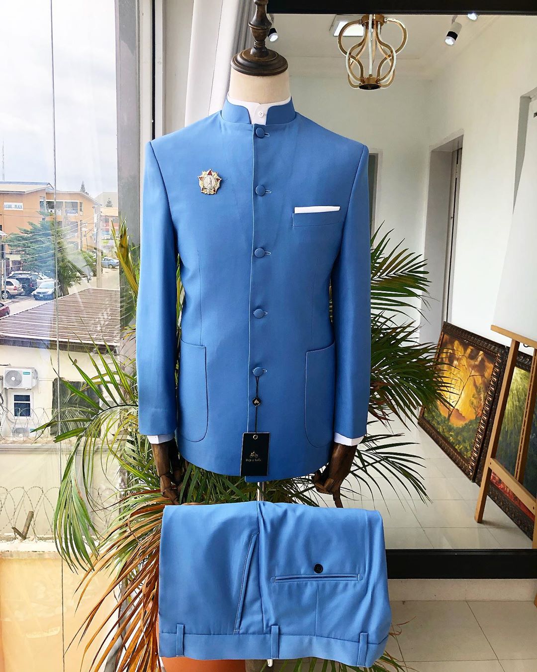 A Powdered Blue “clergyman” French safari Suit and pant trouser