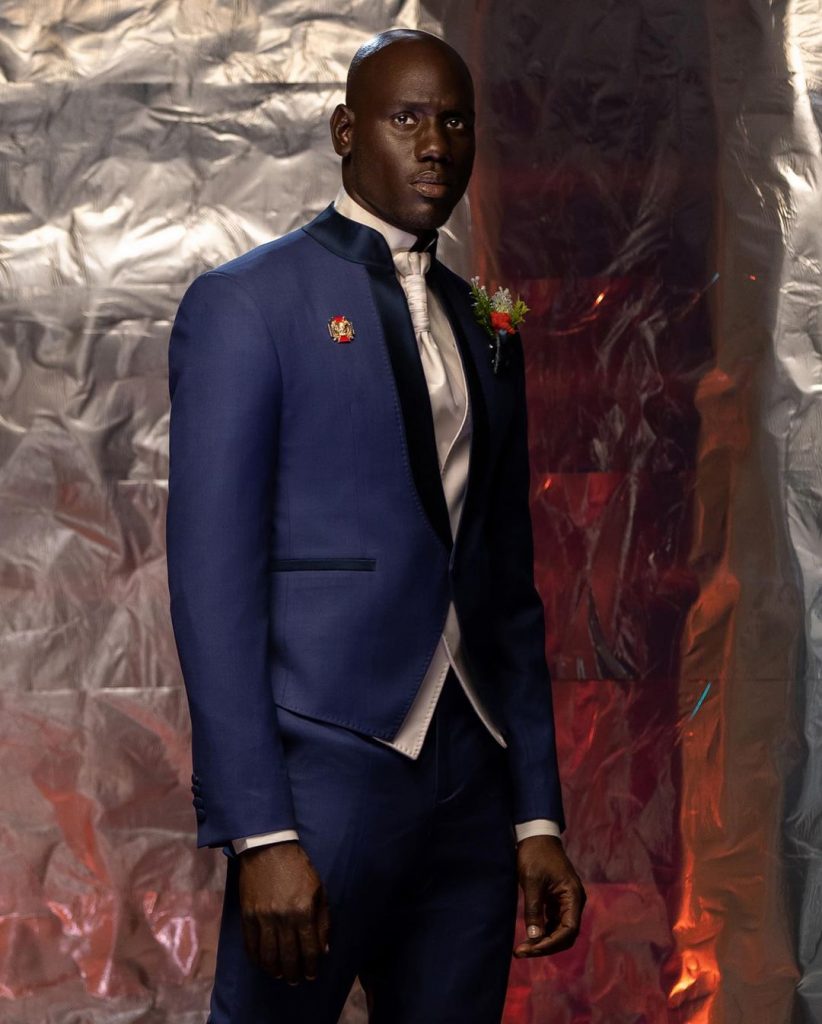 Shop VShaped navy blue “Jefferson” Tuxedo Suit Deji & Kola