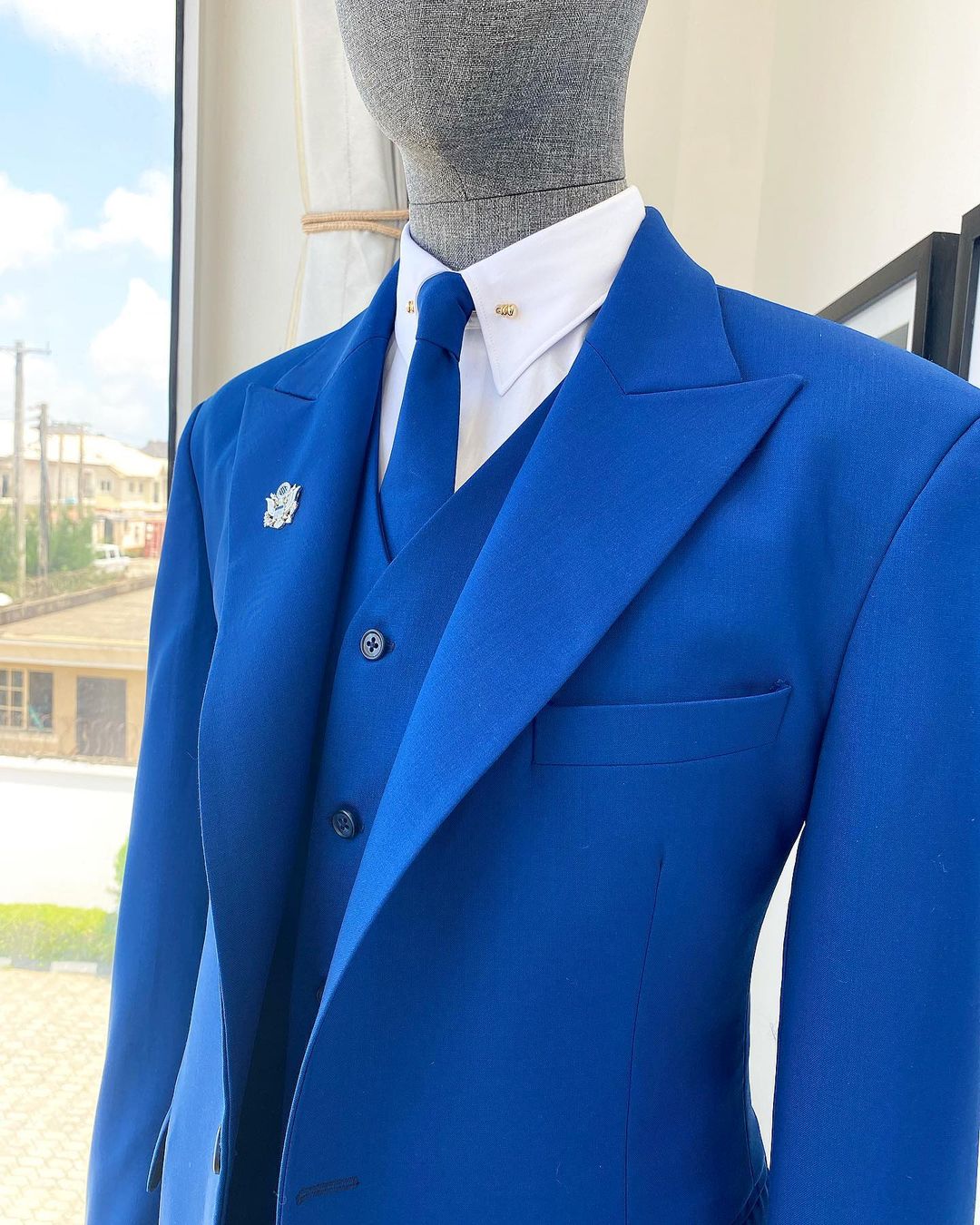 Shop Cobalt blue “board room” peak lapel suit-Deji & Kola