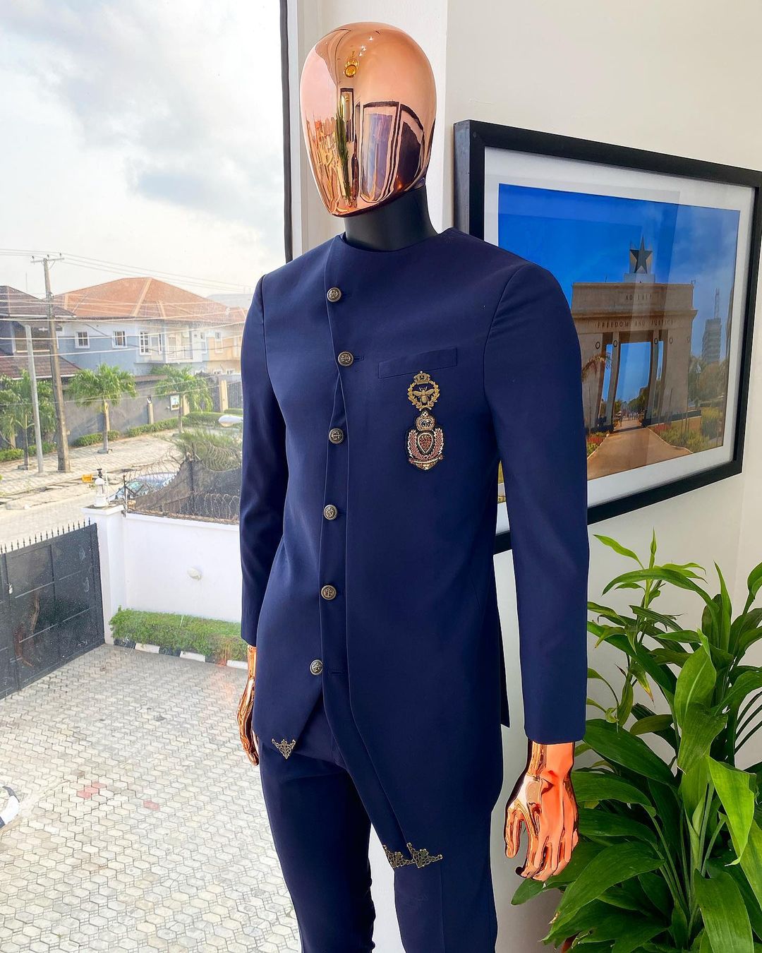 A Navy Blue Reloaded triple layer & adjacent cut “French” safari suit,  bronze buttons, wide back patch, front patch and matching pant