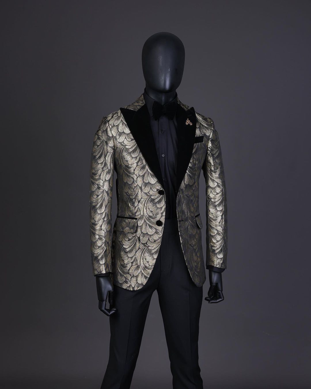 A charcoal black & gold splash, peak lapel tuxedo suit, tuxedo pant trouser  & bow tie